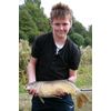 Sept 09 Robbie with a carp Angling4Success