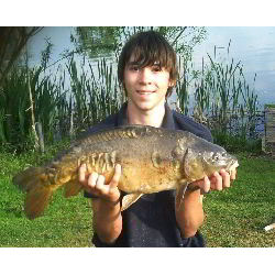 Robert Northman with his PB, a 14lb 6oz carp from the Top Lake.