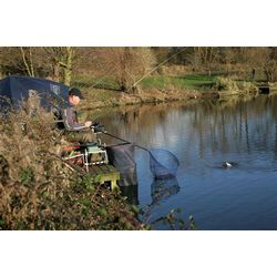 Match organiser Barry Burlton lands a fish in his fourth place finish
