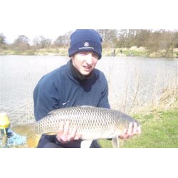 Nick Seaman with one of the many carp he caught from the Pleasure Lake