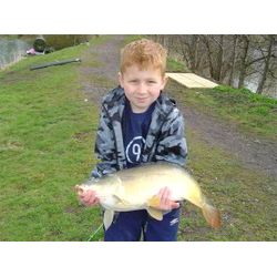 Taylor Eadie with a stunning Mirror Carp from the Pleasure Lake